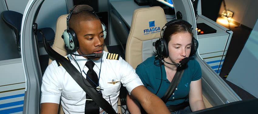 students in a flight simulator